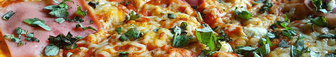 Eating Pizza at Your Place & Ours Pizza & Subs restaurant in Groveland, MA.